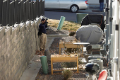 Investigators search a townhouse, in relation to the explosion in Las Vegas of a Tesla Cybertruck