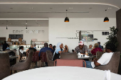 Customers sit inside a bakery in Lagos