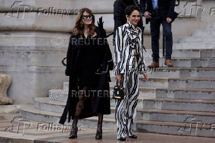 Guests arrive at Schiaparelli Haute Couture Spring/Summer 2025 show in Paris