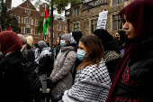 Protest in front of the residence of the University of Michigan's president, in Ann Arbor