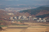 A view shows North Korea's propaganda village Kaepoong, in this picture taken from the top of the Aegibong Peak Observatory, south of the demilitarised zone (DMZ), separating the two Koreas in Gimpo