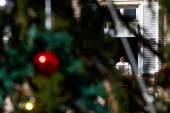 Pope Francis leads the Angelus prayer from his window, at the Vatican