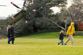 Hunter Biden and wife Melissa Cohen Biden exit Marine One as they arrive at White House