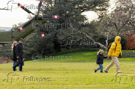 Hunter Biden and wife Melissa Cohen Biden exit Marine One as they arrive at White House