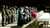 Religious officials hold a ceremony for the remains of the people who died in a military helicopter crash that killed Kenya's military chief, General Francis Ogolla, in Nairobi