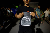 Kashmiri Shia Muslims shout slogans during a protest against Israel following the killing of Hezbollah leader Nasrallah in an Israeli airstrike in Beirut, in Srinagar