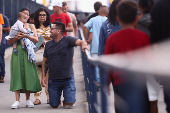 People pay homage to Brazil's patron saint at Cathedral Basilica of the National Shrine of Our Lady Aparecida