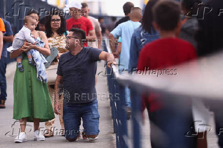 People pay homage to Brazil's patron saint at Cathedral Basilica of the National Shrine of Our Lady Aparecida