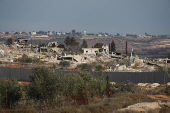 A view of destroyed buildings in southern Lebanon as seen from Israel's side of the border with Lebanon