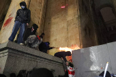 Georgian opposition supporters protest against government's EU application delay, in Tbilisi