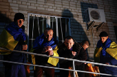 Ukrainian prisoners of war (POWs) return after a swap, in an undisclosed location