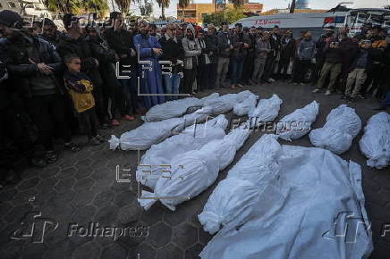 Palestinians mourn their dead at Deir Al Balah hospital after Israeli airstrike in central Gaza