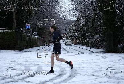 Heavy snow in Liverpool amidst warnings for snow and ice across Britain