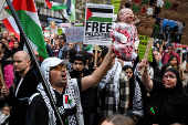 People demonstrate in support of Palestinians in Gaza, in London