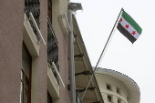 Syrian Embassy in Moscow flies the Syrian opposition flag