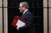 British Prime Minister Keir Starmer walks outside 10 Downing Street in London