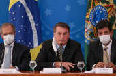 (e/d) ministro Paulo Guedes (Economia) o presidente Bolsonaro e o ministro Luiz Henrique Mandetta (Sade)