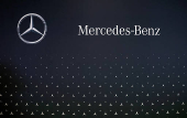 Mercedes-Benz logo on display at the Everything Electric exhibition