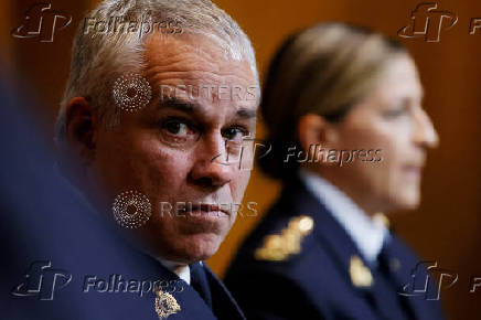 RCMP Commissioner Duheme takes part in a press conference in Ottawa