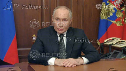 Russian President Vladimir Putin makes a televised address in Moscow