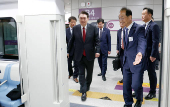 South Korean President Yoon Suk Yeol gets on a train after an opening ceremony of GTX-A in Seoul