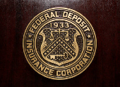 FILE PHOTO: The Federal Deposit Insurance Corp (FDIC) logo is seen at the FDIC headquarters in Washington
