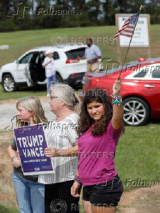 Republican presidential nominee Donald Trump and Georgia Governor Brian Kemp speak to the press about the impact of Hurricane Helene, in Evans