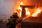 Palisades Fire burns during a windstorm on the west side of Los Angeles