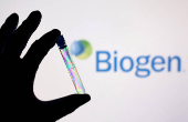 FILE PHOTO: Illustration shows a test tube in front of displayed Biogen logo