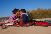 Migrants seeking asylum in the United States gather on the banks of the Rio Bravo river in Ciudad Juarez