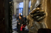 People walk through the Holy Door at Rome's Basilica of Saint Mary Major