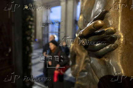 People walk through the Holy Door at Rome's Basilica of Saint Mary Major