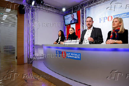 Far-right Freedom Party's co-Secretary-General Christian Hafenecker speaks to reporters