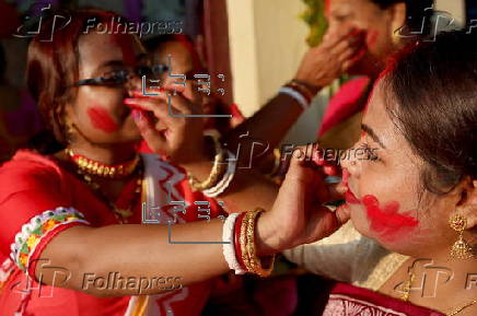 Immersion of idols on the last day of Durga Puja festival in India