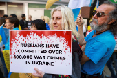 Protesters gather outside the Toronto International Film Festival (TIFF) screening of 'Russians at War', in Toronto