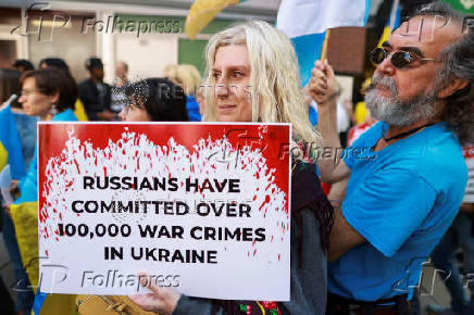 Protesters gather outside the Toronto International Film Festival (TIFF) screening of 'Russians at War', in Toronto