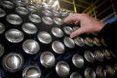 FILE PHOTO: Aluminium cans leave the production line at Ball Corporation, Wakefield