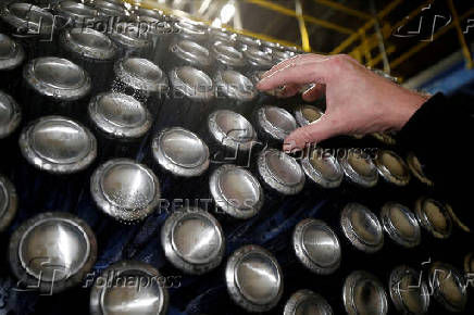 FILE PHOTO: Aluminium cans leave the production line at Ball Corporation, Wakefield