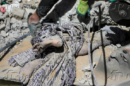 Aftermath of an Israeli strike on a house in Gaza City