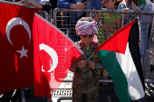 People demonstrate in support of Palestinians in Gaza, in Istanbul