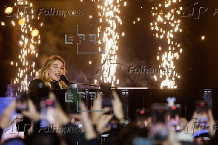 Paris Olympics chief Estanguet turns on Christmas lights on the Champs Elysees