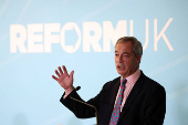 Britain's Reform UK party leader Nigel Farage speaks to the media, in London