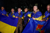 Ukrainian prisoners of war (POWs) return after a swap, in an undisclosed location