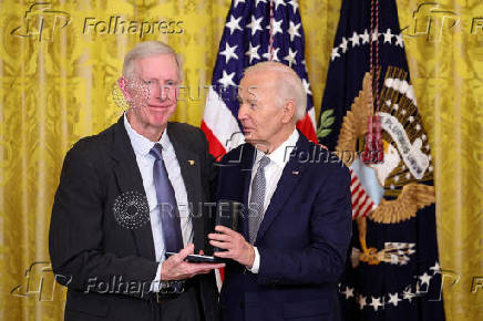 U.S President Biden gives the Presidential Citizens Medal, one of the country's highest civilian honors, during a ceremony at the White House in Washington