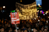 Protesters in Valencia call for regional leader Mazon to resign, in Valencia