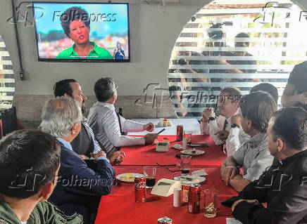 O presidente Jair Bolsonaro na churrascaria Tche Garoto