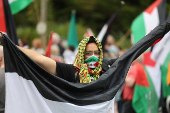 People protest in solidarity with Palestinians in Gaza near the Shannon Airport