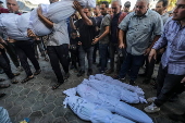 A Palestinian mother and her children killed following fresh Israeli strikes in central Gaza Strip