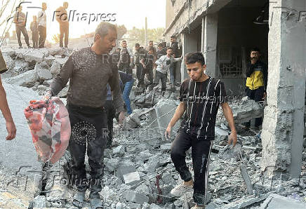 Aftermath of Israeli strike on a house in Gaza's Jabalia