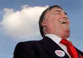 FILE PHOTO: Former deputy Prime Minister John Prescott campaigns outside the entrance to the conference halls during the Labour Party Conference in Manchester northern England